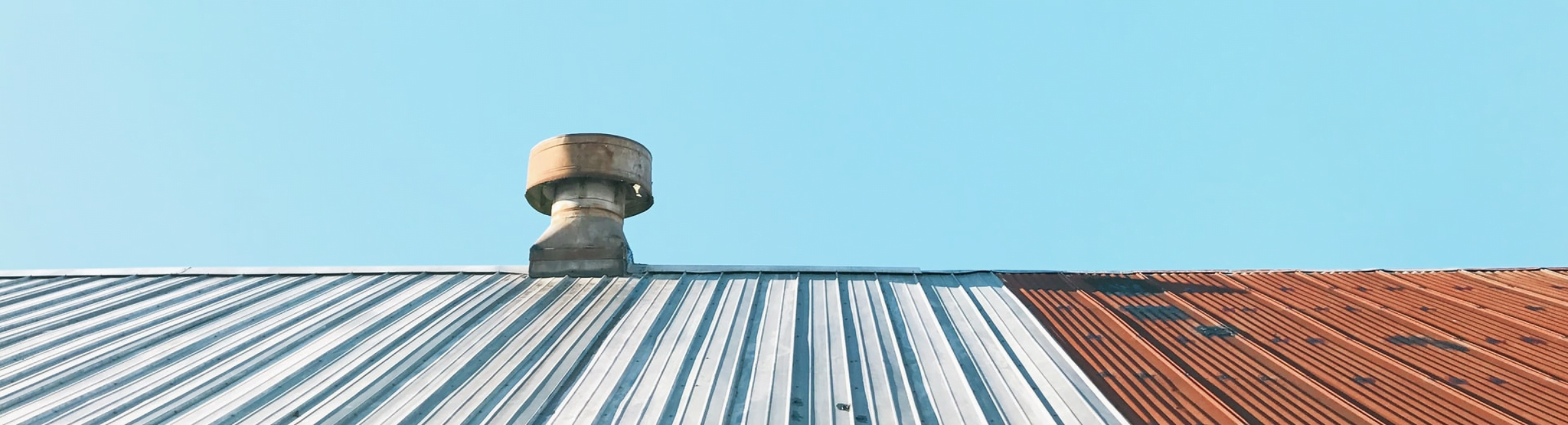 Old corrugated iron roof with vent