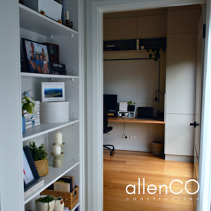 Looking past shelving into a home office