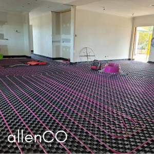 Installation of hydronic underfloor heating in an open living room