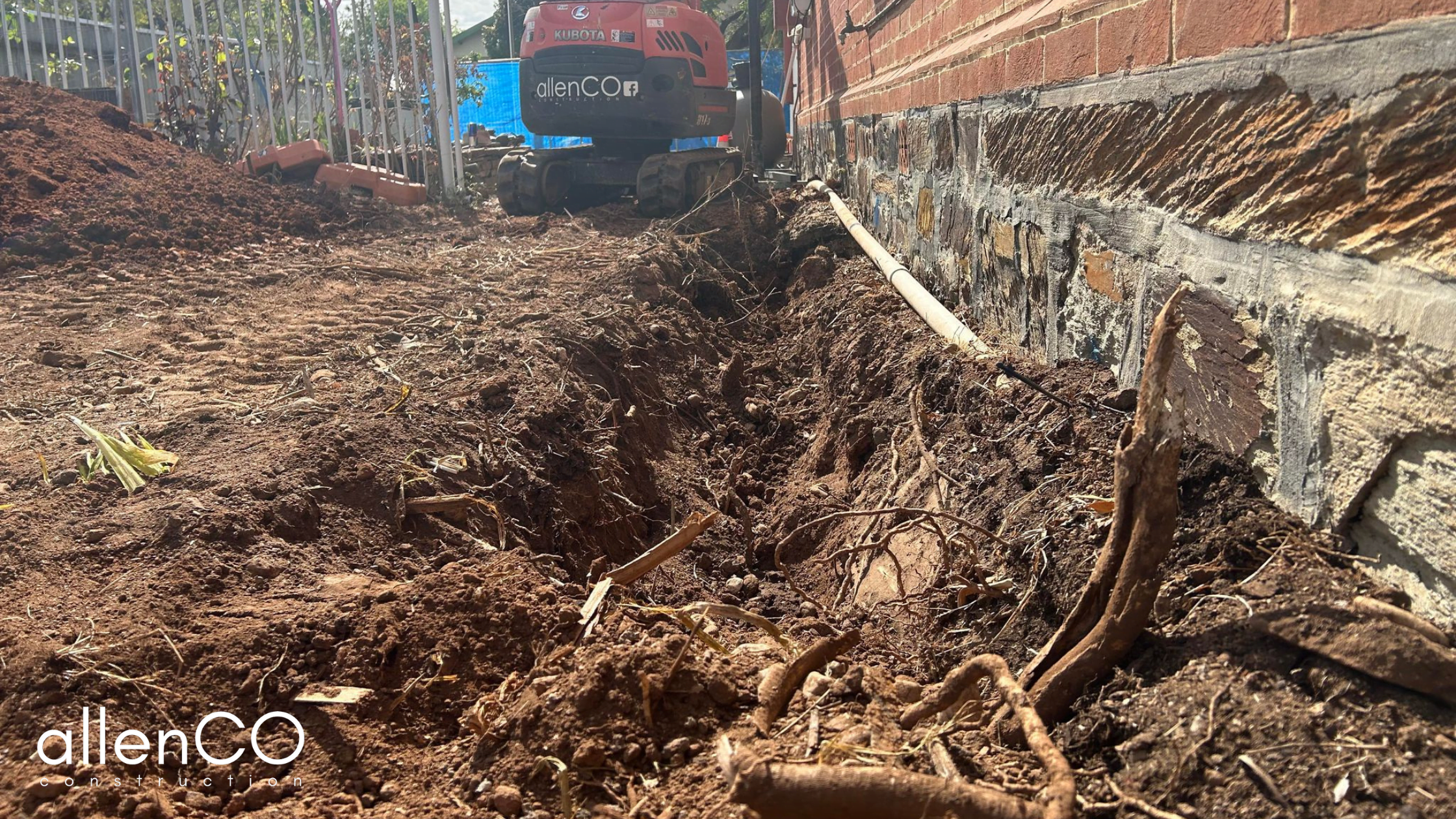 Excavation of damaged stormwater pipes due to tree roots.